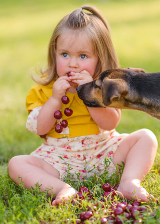 portrait of little girl outdoors in summerの写真素材