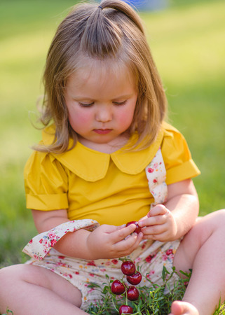 portrait of little girl outdoors in summerの写真素材