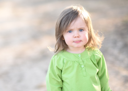 portrait of little girl outdoors in summerの写真素材