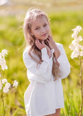 portrait of little girl outdoors in summerの写真素材