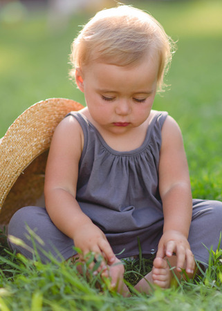portrait of little girl outdoors in summerの写真素材