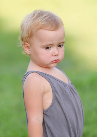 portrait of little girl outdoors in summerの写真素材