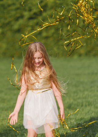 portrait of little girl outdoors in summerの写真素材