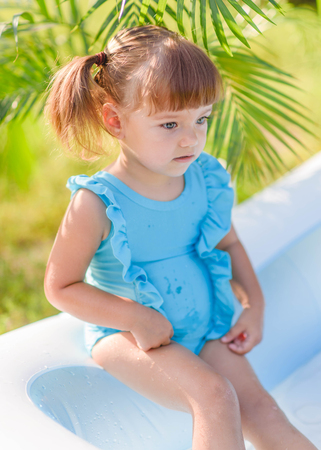 portrait of little girl outdoors in summerの写真素材
