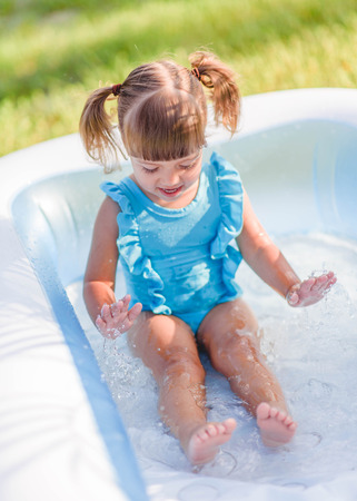 portrait of little girl outdoors in summerの写真素材