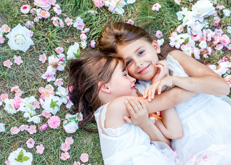 Portrait of two girls in the woods girlfriendsの写真素材