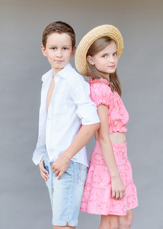 Portrait of a boy and girl  in summerの写真素材