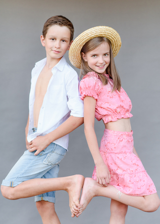 Portrait of a boy and girl  in summerの写真素材
