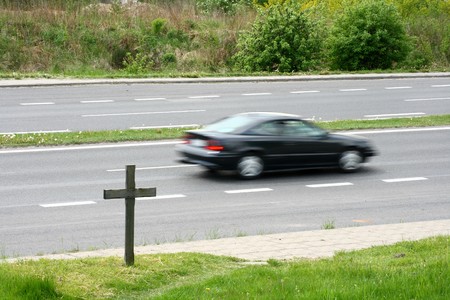 crucifix near the roadの写真素材