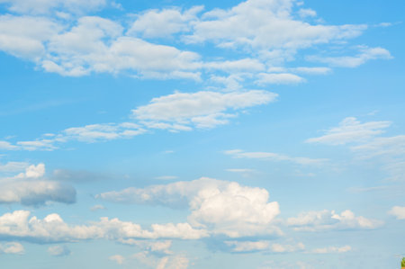 Beautiful white clouds in a clear blue sky