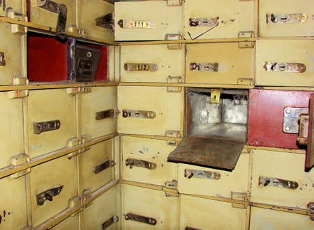 ancient bank cells with locks and keysの写真素材
