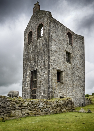 An old ruined engine house left over from Cornish tin and copper mining at Minions on Bodmin Moor in...