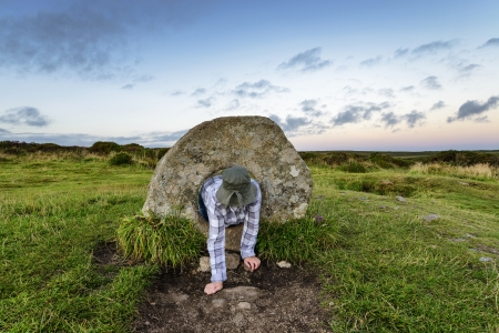 The Men-an-Tol standing stones Near Penzance in Cornwall, local legend says that a person passing through the holed stone can cure many ailments including infertilityのeditorial素材