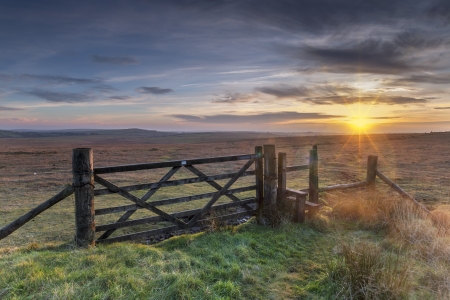 Old wooden five bar field gate and stile on windswept moorland at Bodmin Moor in Cornwallの写真素材