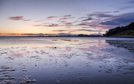 Late dusk at Sandbanks beach in Poole, Dorset.の写真素材