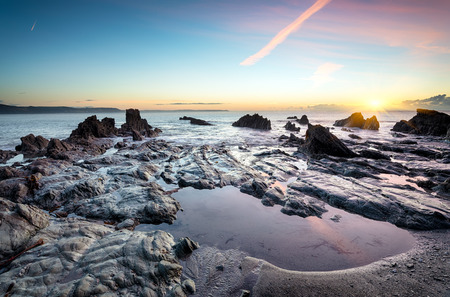 Rock pools on the beach at Looe in Cornwall