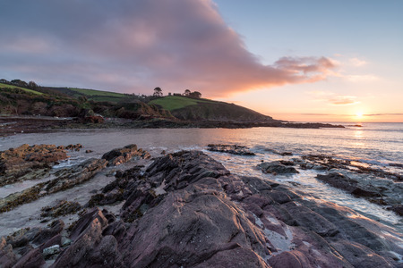 Sunrise at Talland Bay a secluded beach between Polperro and Looe in Cornwall