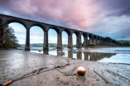 A railway viaduct crossing the quay at St Germans in Cornwallの写真素材