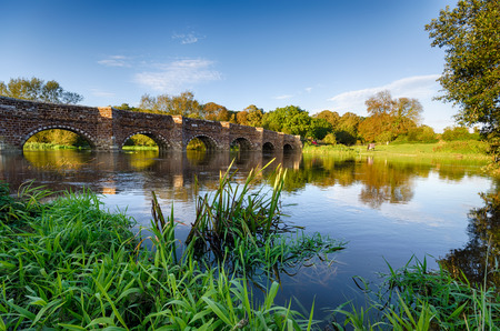 White Mill Bridge at Sturminster Marshall on the banks of the River Stour, reputedly the oldest bridge in Dorsetの写真素材
