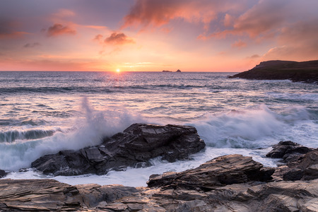 Waves at hight tide at Booby's Bay on the edge of Constantine Bay near Padstow in Cornwallの写真素材