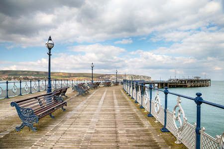 A Victorian seaside pier at Swanage a small town on Dorsetの写真素材