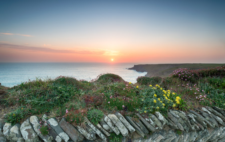 Sunset from the South West Coast Path at Park Head near Porthcothan on the north Cornwall coast