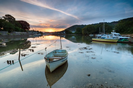 Sunrise on the creek at Millbrook on the Cornwall coastの写真素材