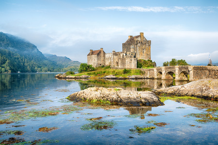 Early morning sunlight over Eilean Donan Castle at Kyle of Lochalsh in the Western Highlands of Scotlandのeditorial素材
