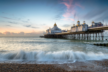 The beach and pier at Eastbourne on the East Sussex coastlineの写真素材