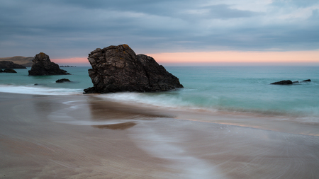 Dusk over sea stacks at Sango Bay at Durness in the Scottsih highlandsの写真素材