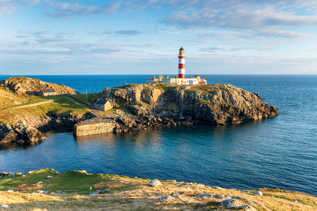Eilean Glas Lighthouse on the Isle of Scalpay, a small isle of the Isle of Harris in the Outer Hebrides of Scotlandの写真素材