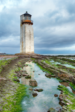 Southerness lighthouse on the Solway Firth on the coast of Galloway in Scotlandの写真素材