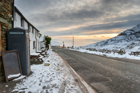Winter on the top of the Kirkstone Pass in the Lake District national park in Cumbriaの写真素材