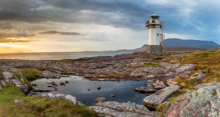 A panoramic view of the lighthouse at Rhue, just outside Ullapool in the far north west of Scotlandの写真素材