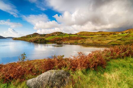 Looking out over Loch inchard cloaked in Autmun colour at kinlochbervie in the highlands of Scotland...