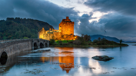 Nighfall over Eilean Donan castle on the shores of Loch Alsh at Dornie in the Highlands of Scotlandのeditorial素材