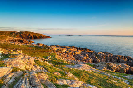 Sunset ove the coastline at Huisinis on the Isle of Harris in the Outer Hebrides of Scotland