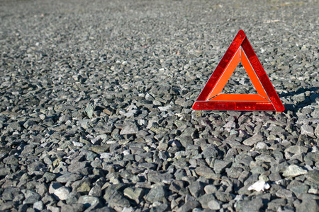 the sign of an emergency stop costs on the earth