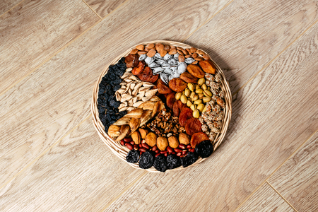 hazelnuts on a wooden boardの写真素材