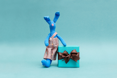 a funny rabbit with a beautiful giftの写真素材
