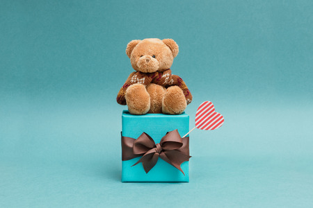A funny bear with a beautiful giftの写真素材