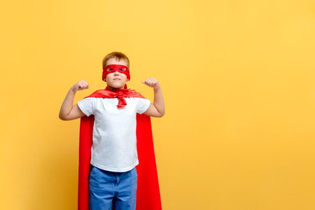 child superhero costume in the backgroundの写真素材