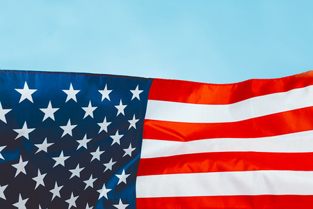 big american flag on blue background