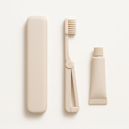 Toothbrushes and toothpaste on white background, top viewの素材