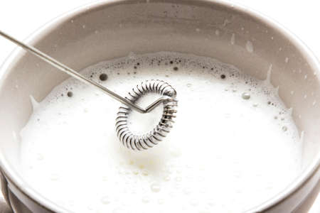 Whisk for whipping milk, cappuccinoの写真素材