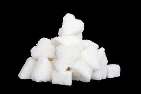 Sugar cubes on a black background