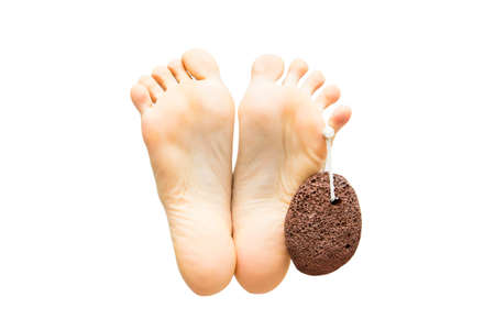 Caring for women's legs on a white backgroundの写真素材
