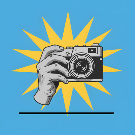 Illustration of hand holding a retro camera with sunburst in the backgroundの素材