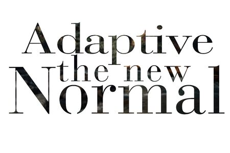 ADAPTIVE THE NEW NORMAL text on a blurred out forest. New normal after pandemic. Corona Virus outbreak concept.の写真素材