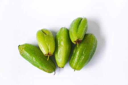 A group of green and yellowish of Averrhoa bilimbi isolated on white backgroundの写真素材